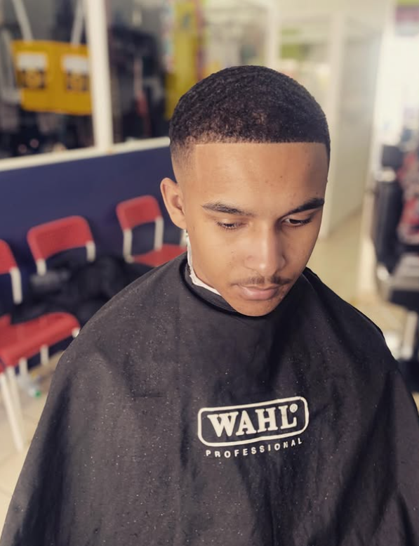Low drop fade with a straight edged hairline and waved short top, Macveli Cuts barber SE1
